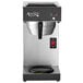 An Avantco silver and black automatic coffee maker with a bowl on the side.