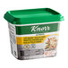 A container of Knorr Low Sodium Chicken Bouillon Base with a green lid.