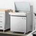 An Avantco stainless steel refrigerator with a lid open.