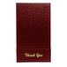 A white rectangular check presenter with gold text on the front.