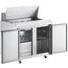 An Avantco stainless steel double door refrigerator with a door open.