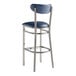 A Lancaster Table & Seating bar stool with a blue vinyl seat and back and silver legs.