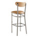 A Lancaster Table & Seating bar stool with a light brown vinyl seat and back.