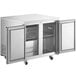 An Avantco stainless steel undercounter freezer with two doors open.