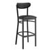 A Lancaster Table & Seating black bar stool with a black vinyl seat and back.