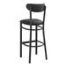 A Lancaster Table & Seating black bar stool with black vinyl seat and back.