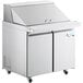 An Avantco stainless steel refrigerated sandwich prep table with two doors.