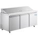 An Avantco stainless steel refrigerator with three doors.