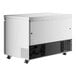 A white rectangular Avantco undercounter freezer with black accents and wheels.