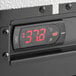 a digital clock with red numbers