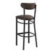 A Lancaster Table & Seating black bar stool with dark brown vinyl seat and backrest.