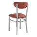 A Lancaster Table & Seating Boomerang Series chair with burgundy vinyl seat and back.