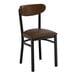 A black metal chair with a dark brown vinyl seat and backrest.