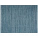 A close-up of a blue and white woven rectangular placemat with a basketweave pattern.
