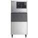 A Hoshizaki stainless steel air cooled ice machine with a door open.