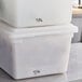 a stack of plastic containers