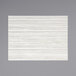 A white woven vinyl rectangle placemat with a gray shell rush design.