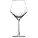 A clear Schott Zwiesel Pure Burgundy wine glass with a stem.