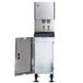 A stainless steel Hoshizaki ice maker and water dispenser with a door open.