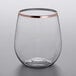 A Visions clear plastic stemless wine glass with a copper rim.