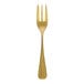 A Sola stainless steel cake fork with a gold handle.