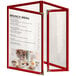 A red H. Risch, Inc. menu cover with gold corners on a white surface.