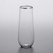 a clear glass with a silver rim