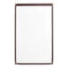 A white board with a brown frame.