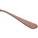 A Sola stainless steel table fork with a wooden handle.