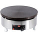 a round black surface on a silver surface