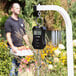 A black AvaWeigh digital hanging scale with a screen and a hook.