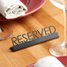 a reserved sign on a table