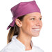 A woman wearing a mauve Intedge chef bandana.