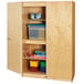 A Jonti-Craft wooden storage cabinet with shelves holding objects.