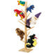 A Jonti-Craft wooden tree with stuffed animals on it.