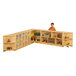 A child standing behind a Jonti-Craft wood inside corner storage cabinet.