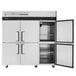 A white Turbo Air reach-in refrigerator with black half doors open.