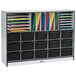 A Rainbow Accents black storage cabinet with black trays holding file folders and black bins.