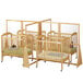 A Jonti-Craft Hard Maple Wood See-Through Quad Crib Divider with cribs on wheels.