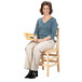 a person sitting on a chair