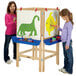 Two young girls painting on a Jonti-Craft easel.