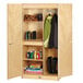 A Jonti-Craft wooden wardrobe closet with shelves and a lock.