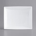 A white rectangular porcelain platter with an embossed border.