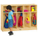A child standing in front of a Jonti-Craft wooden toddler-height locker.