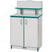 A teal kitchen cupboard with white and blue accents and two doors.