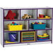 A Rainbow Accents purple and white storage cabinet with toys on the shelves.