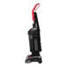 A Sanitaire bagless upright vacuum cleaner with a red handle.