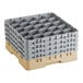 A beige plastic Cambro glass rack with many compartments.