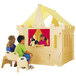 Two children playing with toys in a Jonti-Craft wooden castle.