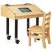 a wooden desk with a screen on it